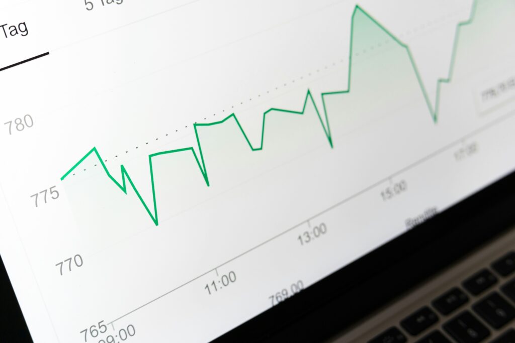 Close up of a green line chart displayed on a computer screen